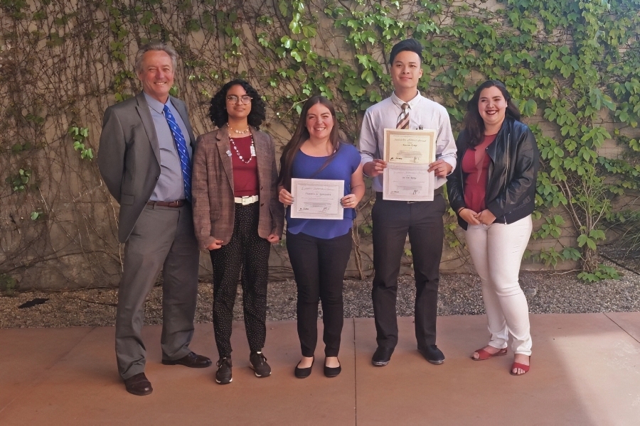 honors program coordinator brian waddington with four citrus college honors students following their presentations at the honors transfer council of california undergraduate research conference