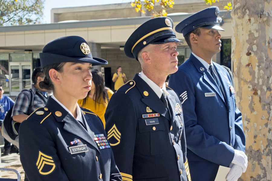 three service members stand in uniform during a citrus college event recognizing support for student veterans and military students