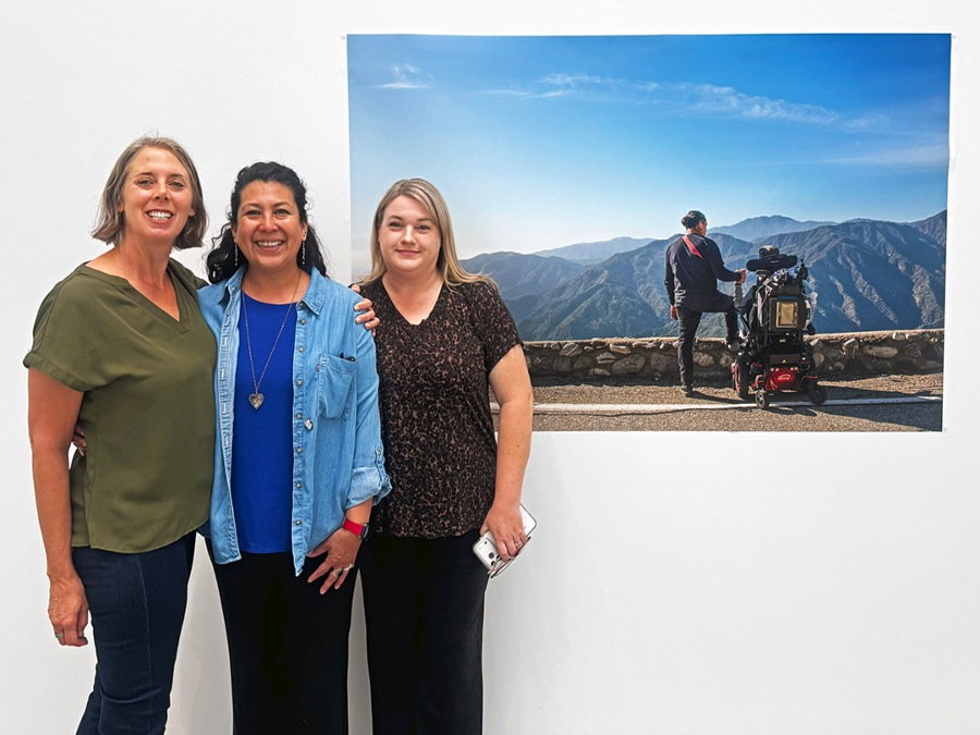 Daniella  Navarro is pictured at her exhibition with Citrus College Photography instructors Amanda Keller Konya and Kim Toth.