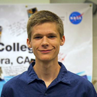 headshot of Joshua McGinnis